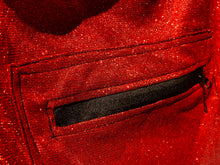 Load image into Gallery viewer, Close up view of red glitter fabric and the zipper kangaroo pouch