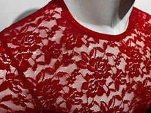 Load image into Gallery viewer, Close up of T-shirt made of a dark red colored lace fabric, worn by a mannequin