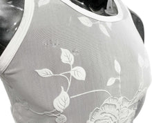 Load image into Gallery viewer, Close up view of mannequin wearing white mesh tank top with flocked rose patterns