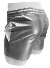 Load image into Gallery viewer, Side rear view of mannequin wearing silver faux leather shorts with side pockets and a white string waistband