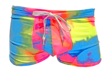 Load image into Gallery viewer, Booty shorts made of a soft tie-dyed fabric. Colors are vibrant blue, pink, and yellow. Features a white shoestring waistband