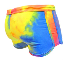 Load image into Gallery viewer, Side rear view of booty shorts made of a tie-dyed fabric. Colors are vibrant blue, pink, and yellow