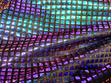 Load image into Gallery viewer, Close up view of iridescent purple metallic squares fabric, with creases to show reflectiveness