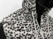 Load image into Gallery viewer, Close up view of the zipper on a fuzzy white leopard print sleeveless zip-up hoodie