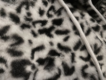 Load image into Gallery viewer, Close up view of faux fur white leopard print fabric