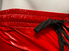Load image into Gallery viewer, Close up view of the black drawstring waistband of red high gloss shorts