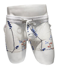 Load image into Gallery viewer, White mesh shorts with blue embroidered threads, featuring side pockets and a drawstring.