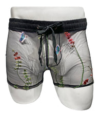 Load image into Gallery viewer, A pair of black mesh shorts with red, blue, green, and pink embroidered threads, featuring side pockets and a drawstring.