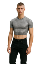 Load image into Gallery viewer, Man wearing a silver glitter crop top and black pants