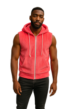 Load image into Gallery viewer, Man wearing a fuzzy pink sleeveless hoodie with a zipper