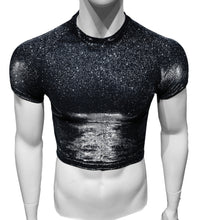 Load image into Gallery viewer, A mannequin wearing a short sleeve crop tee in black with silver glitter undertones.