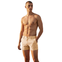 Load image into Gallery viewer, Tan chino shorts worn by a shirtless model