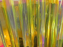 Load image into Gallery viewer, Close up of reflective gold vinyl fan