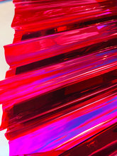 Load image into Gallery viewer, Close up of iridescent fuchsia-colored fan with black painted bamboo spines and a rose gold back with emerald