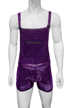Load image into Gallery viewer, Mannequin wearing purple glitter overalls with button straps, zipper kangaroo pocket, and side pockets