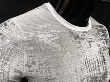 Load image into Gallery viewer, Close up of mannequin wearing white silver leaf metallic tee
