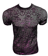 Load image into Gallery viewer, A short-sleeve crewneck t-shirt with a sheer black mesh base and an intricate purple damask floral pattern, displayed on a headless mannequin torso against a white background.
