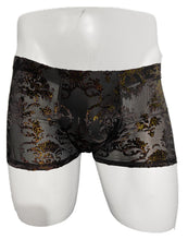 Load image into Gallery viewer, Black sheer lace boxer briefs with a gold damask pattern, displayed on a white mannequin torso against a white background.
