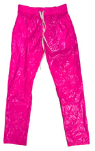 Load image into Gallery viewer, High gloss pink pants with two side pockets and an elastic waist, displayed against a white background.
