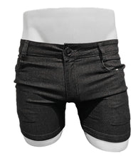 Load image into Gallery viewer, Black denim shorts displayed on a white mannequin against a plain white background.

