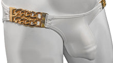 Load image into Gallery viewer, Close up of a white swim brief, showing gold chains at the sides that hold the fabric
