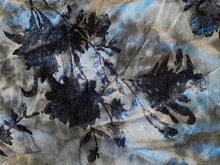 Load image into Gallery viewer, A close-up of a fabric surface with a distressed floral or leafy pattern in dark navy and black
