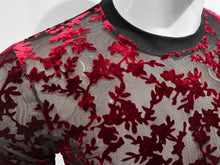 Load image into Gallery viewer, Close-up of a sheer black mesh top with deep red floral embroidery, displayed on a white mannequin torso.

