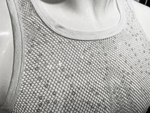 Load image into Gallery viewer, Close-up of a white sleeveless mesh top on a mannequin torso, showing the sequined fabric and scoop neckline.
