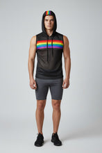 Load image into Gallery viewer, Model wearing a  black sports mesh hooded tank top with a rainbow stripe across the upper chest and another stripe in the middle of the hood. Background is white and model is wearing the hood
