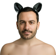 Load image into Gallery viewer, Man wearing black cat ears on a white background
