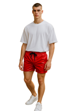 Load image into Gallery viewer, Man wearing a white t-shirt and red shorts with a black drawstring tied into a bow
