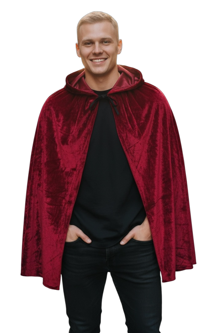 Man wearing a red velvet cape that goes slightly below his hips with a plain background