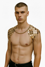 Load image into Gallery viewer, Man wearing a gold chain necklace and attached checkered metal squares shoulder piece against a white background

