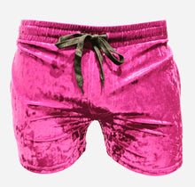 Load image into Gallery viewer, Front view of hot pink velvet pocket shorts with side pockets, featuring a drawstring waistband.
