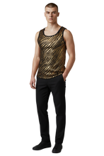 Load image into Gallery viewer, Model wearing a gold and black metallic tank top with a tiger stripe design. Fabric is speckled with sequins
