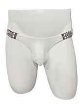 Load image into Gallery viewer, Mannequin wearing white swim brief with silver chains at the sides that hold the fabric
