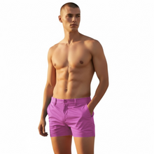 Load image into Gallery viewer, Lavender chino shorts worn by a shirtless model
