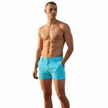 Load image into Gallery viewer, Sky blue chino shorts worn by a shirtless model

