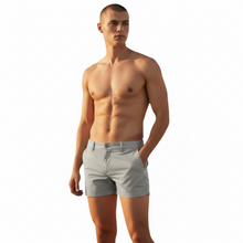 Load image into Gallery viewer, Steel gray chino shorts worn by a shirtless model
