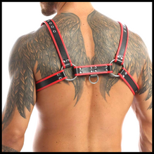 Load image into Gallery viewer, Person wearing a black and red faux leather harness on a white background
