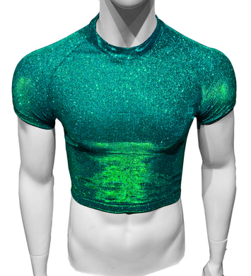 A mannequin wearing a glittery short-sleeve crop top in green 