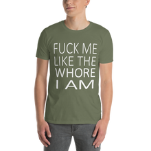 Load image into Gallery viewer, Model wearing an army green t-shirt with printed words reading "fuck me like the whore I am"
