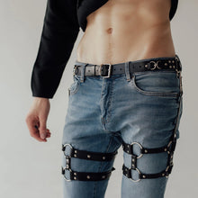 Load image into Gallery viewer, Person wearing blue jeans with black harnesses over on a plain background
