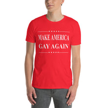 Load image into Gallery viewer, Red t-shirt with 'MAKE AMERICA GAY AGAIN' text worn by a person on a white background

