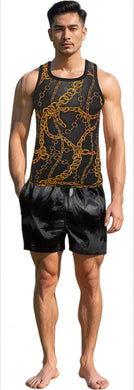 Man wearing a black tank top with gold chain design and black shorts