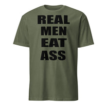 Load image into Gallery viewer, Army Green t-shirt with black text &#39;REAL MEN EAT ASS&#39;
