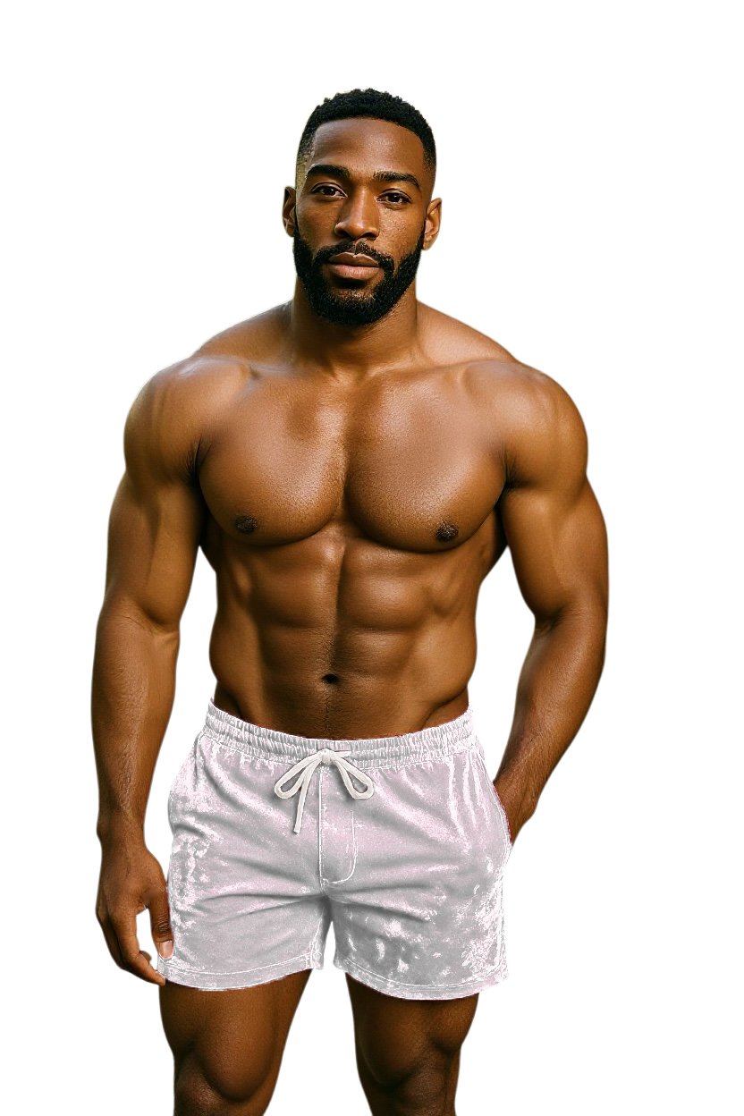 Muscular man wearing white velvet shorts with pockets and drawstring 