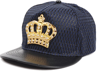 A navy-colored flat-bill cap with a metallic jeweled crown plate featuring rhinestones on it.