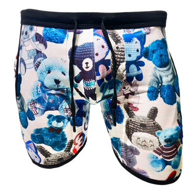 A pair of gym shorts featuring a blue teddy bear print on a white background.